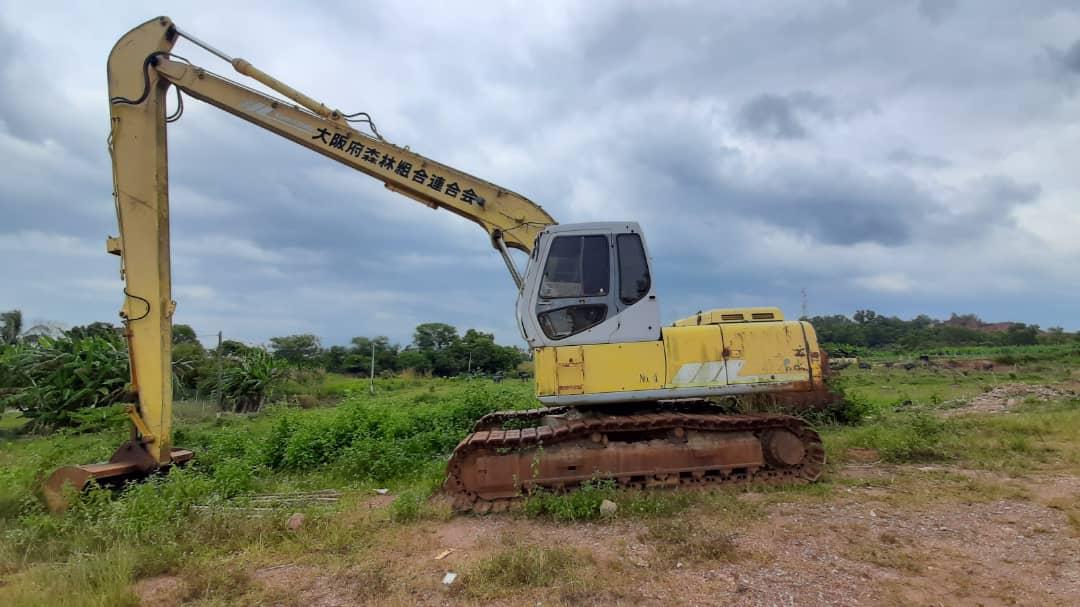 Yellow tracked excavator - Photo reference R02 - Ooi Bah Seng & Sons